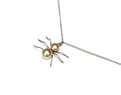 Lot 19 - A silver and pearl spider pendant necklace.