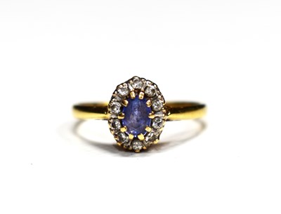Lot 138 - An 18ct gold, diamond and amethyst ring, size...