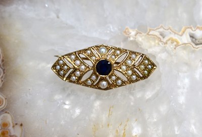 Lot 174 - A 9ct gold, pearl and sapphire navette form...