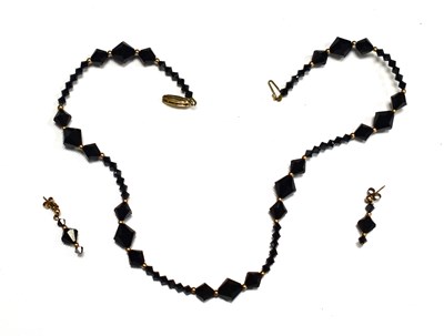 Lot 57 - A Jet and 9ct gold necklace with matching...