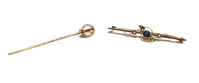 Lot 81 - A 15ct gold hat pin, 0.9g, together with a 9ct...