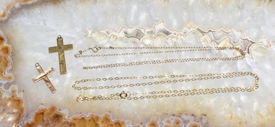 Lot 78 - Two 9ct gold cross pendants and two necklaces,...