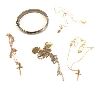 Lot 82 - Two 9ct gold cross pendants and chains, 5.1g,...