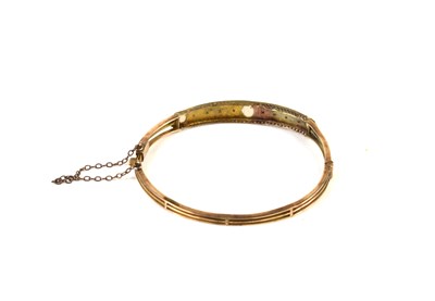 Lot 16 - An antique 9ct gold, opal and garnet hinged...