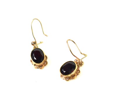 Lot 111 - A pair of 9ct gold and garnet earrings, 3.44
