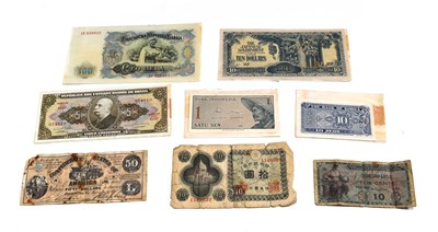 Lot 21 - A group of banknotes to include a Bank of...