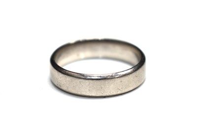 Lot 193 - A platinum wedding band, size P, 6.9g.