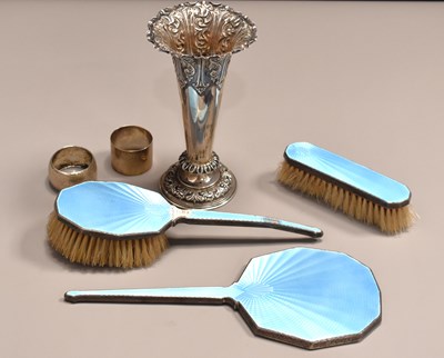 Lot 111 - A group of silver to include two napkin rings,...