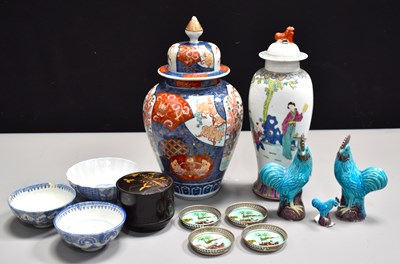 Lot 161 - Three pottery Chinese cockerels, in blue glaze,...