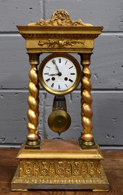 Lot 178 - An antique French portico clock, the white...