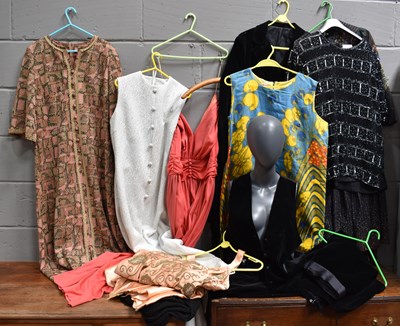 Lot 336 - A large selection of vintage clothing from 60s,...