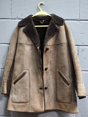 Lot 327 - A 1970s suede and sheepskin lined coat,...