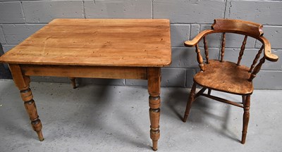 Lot 538 - A small antique pine kitchen table with...