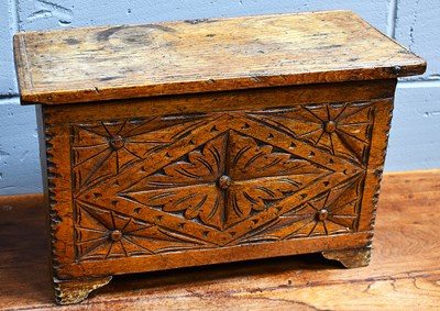 Lot 555 - An 18th century oak coffer, with a later...