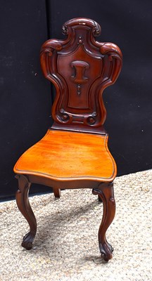 Lot 528 - A Victorian mahogany shield back hall chair,...