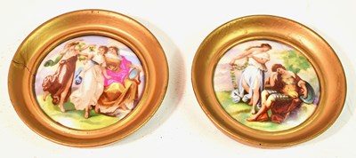 Lot 357 - Two framed porcelain plaques handpainted with...