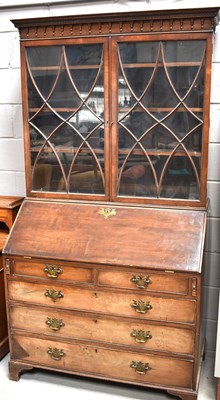 Lot 546 - A 19th century mahogany bureau bookcase with...