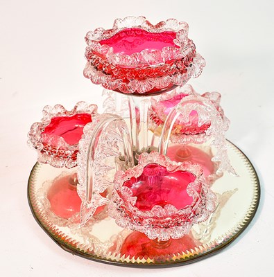 Lot 251 - An early 20th century cranberry glass epergne...