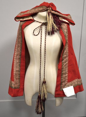 Lot 333 - A red antique children's opera cloak with a...