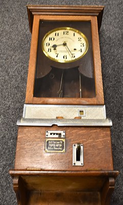 Lot 180 - A British Time Recorder Company oak cased...