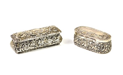 Lot 306 - A group of silver pill boxes to include an...