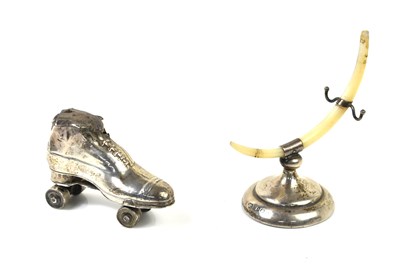 Lot 322 - An Edwardian silver pin cushion in the form of...