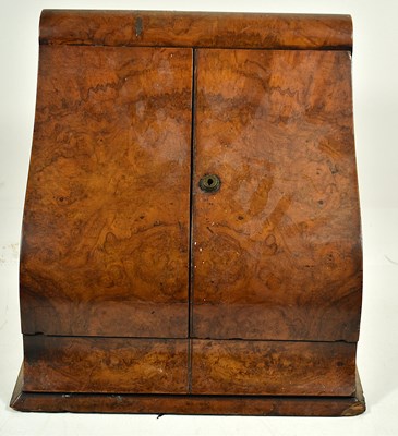 Lot 304 - An antique walnut stationary box,the front...
