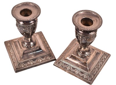 Lot 90 - A pair of Victorian silver candlesticks,...