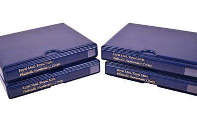 Lot 65 - Four albums containing various numismatic /...