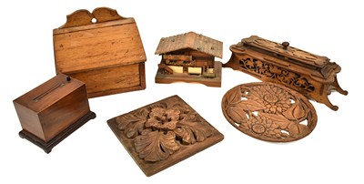 Lot 173 - A group of treen to include a musical box in...