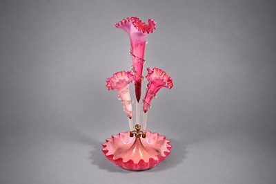 Lot 246 - A Victorian cranberry vaseline glass epergne...