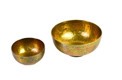 Lot 343 - Two Middle Eastern brass bowls, one likely...