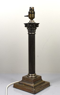 Lot 93 - A silver plated antique lamp base in the form...