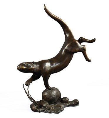 Lot 273 - A bronze sculpture of an otter, swimming pose...