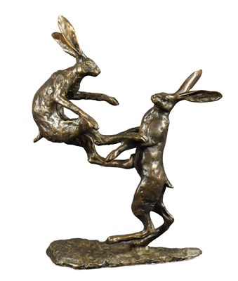 Lot 275 - A bronze sculpture of two dancing hares,...
