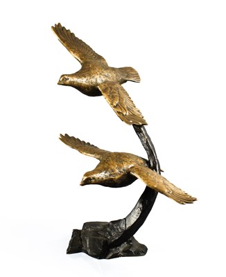 Lot 277 - A bronze sculpture of two partridges in flight,...