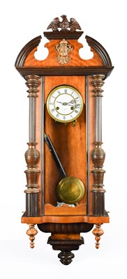 Lot 255 - A 19th century Vienna mahogany wall clock, by...