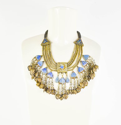 Lot 110 - A Middle Eastern white metal bib necklace with...