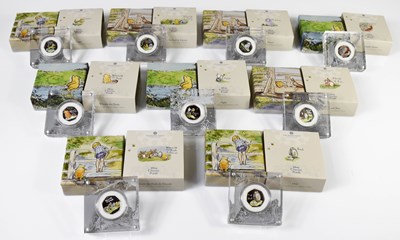 Lot 9 - A group of nine Royal Mint "Winnie the Pooh"...