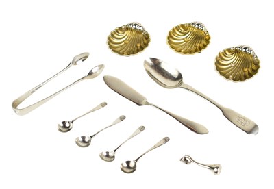 Lot 339 - A group of silver to include sugar nips, tea...