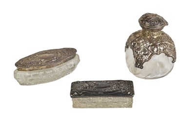 Lot 312 - A group of silver and glass dressing table...