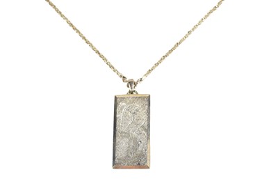 Lot 62 - A sterling silver ingot pendant on a silver...