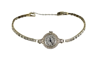 Lot 285 - A ladies 14ct white gold and diamond watch,...