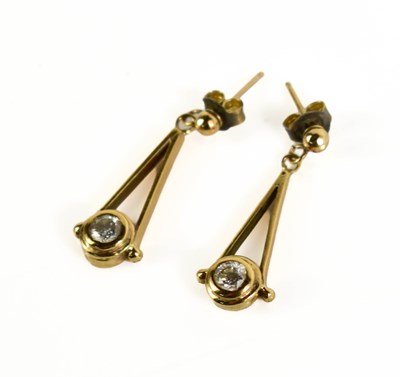 Lot 233 - A pair of gold and brilliant white diamond...