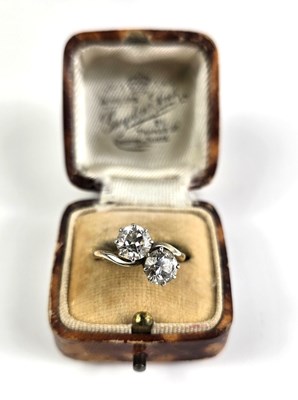 Lot 18 - An 18ct gold and diamond Toi et Moi ring, each...