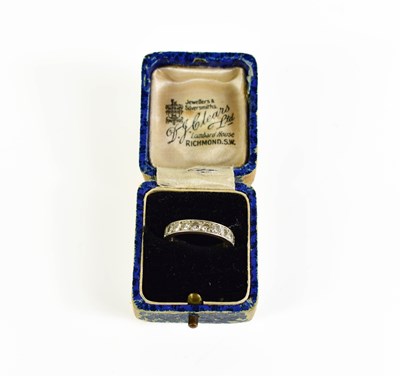 Lot 148 - A white metal eternity ring, size M, 4.2g,...
