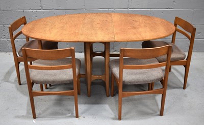 Lot 509 - A Mid-Century G-Plan drop leaf dining table...