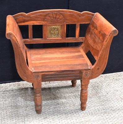 Lot 489 - An Eastern Asian carved throne armchair, with...