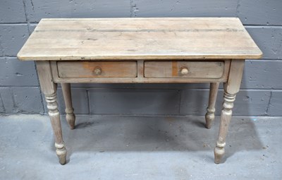 Lot 490 - A Victorian style pine table, plank top, two...