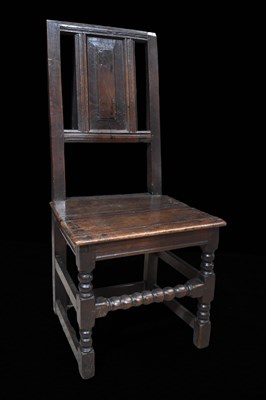 Lot 493 - A 17th century oak Welsh back stool / dining...